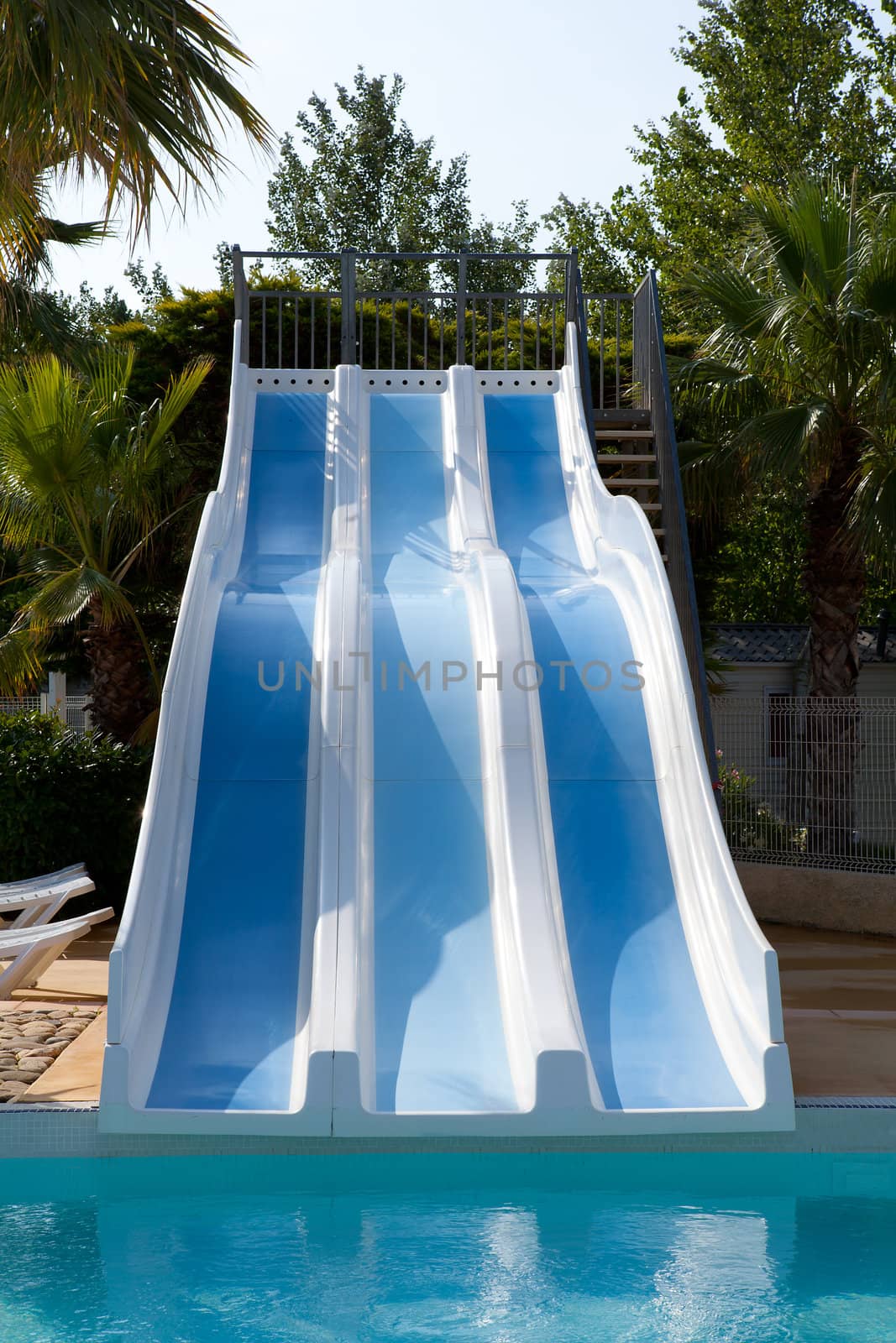 closeup of slide near the swim pool on sunny day