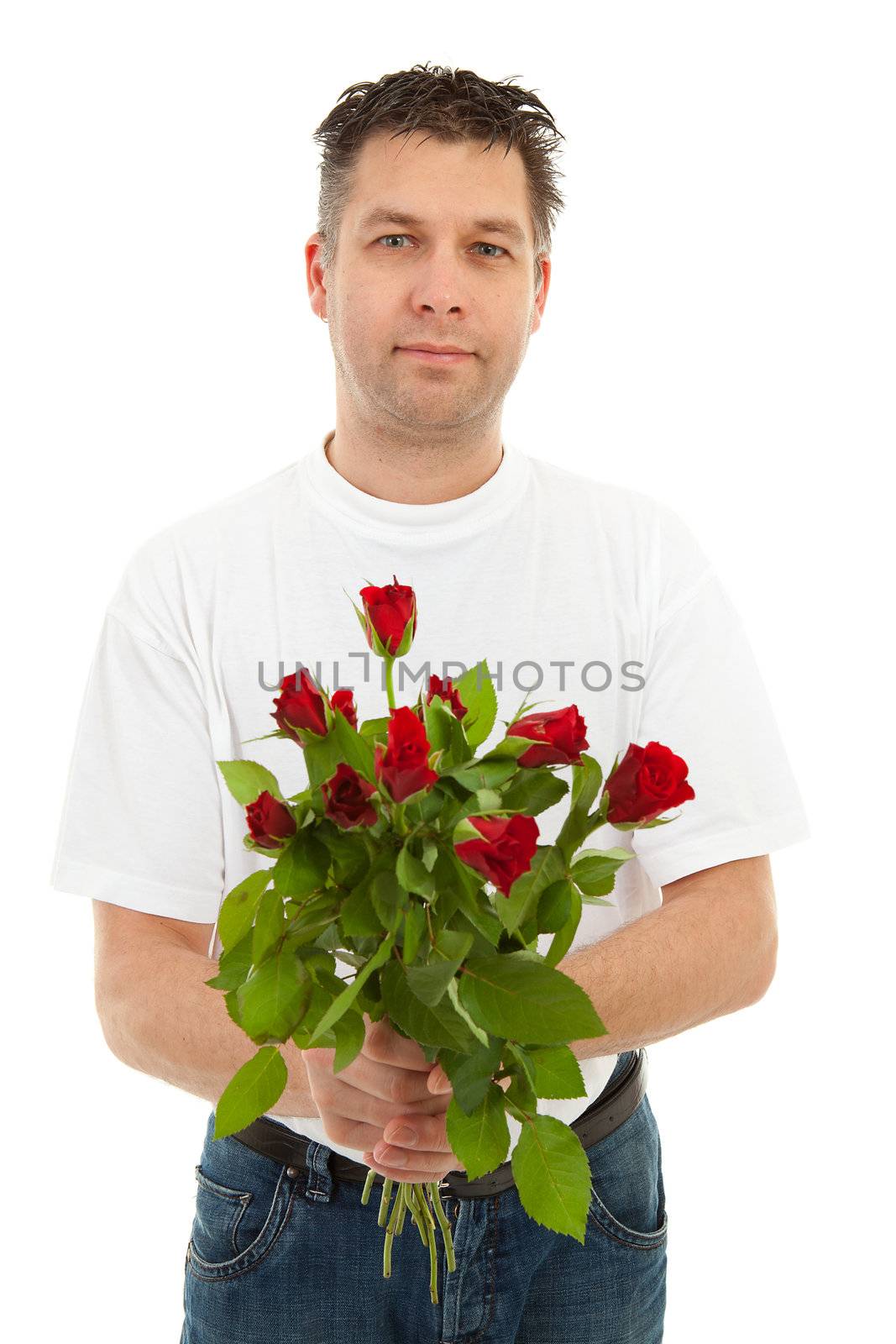 Handsome man is giving bouquet of roses,  isolated on white background