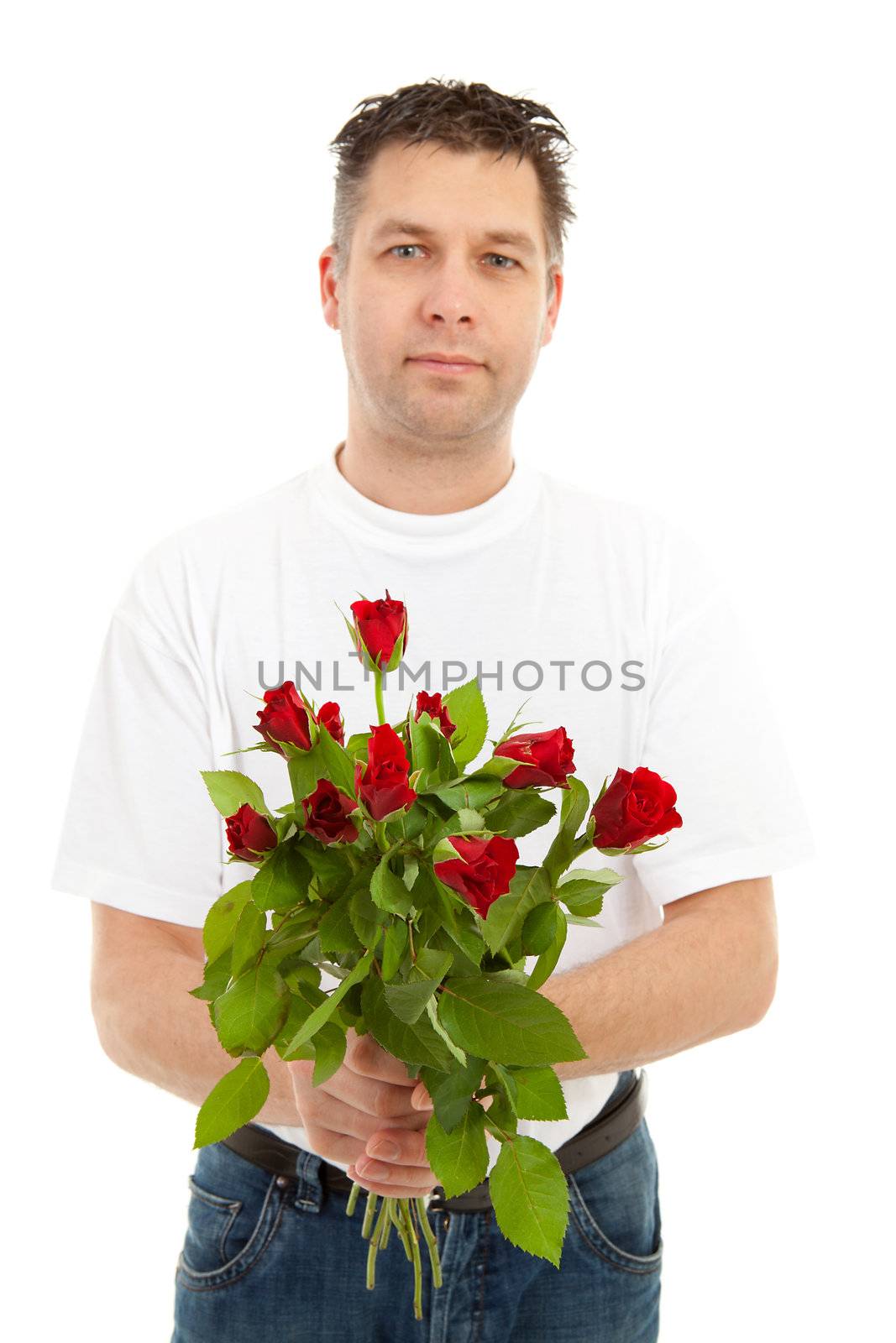 Handsome man is giving bouquet of roses,focus on flowers and person is blur,  isolated on white background