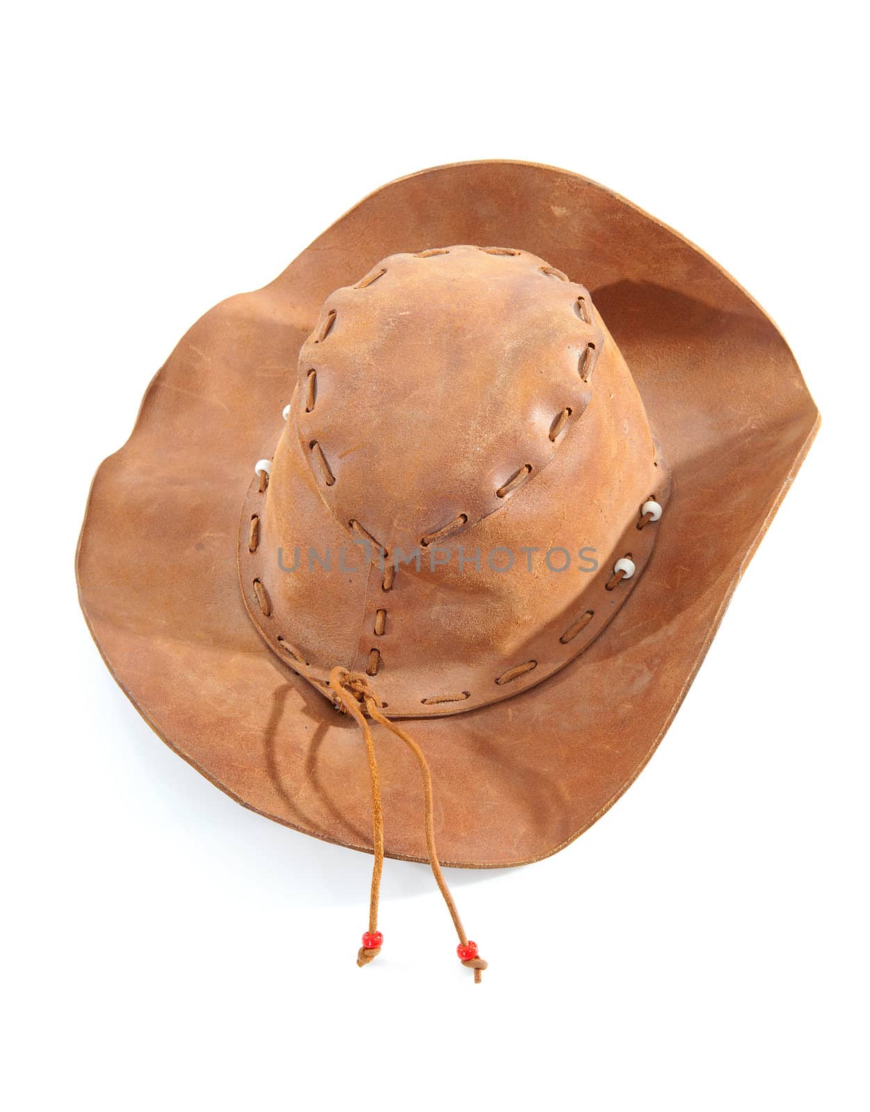 brown western hat on white background 
