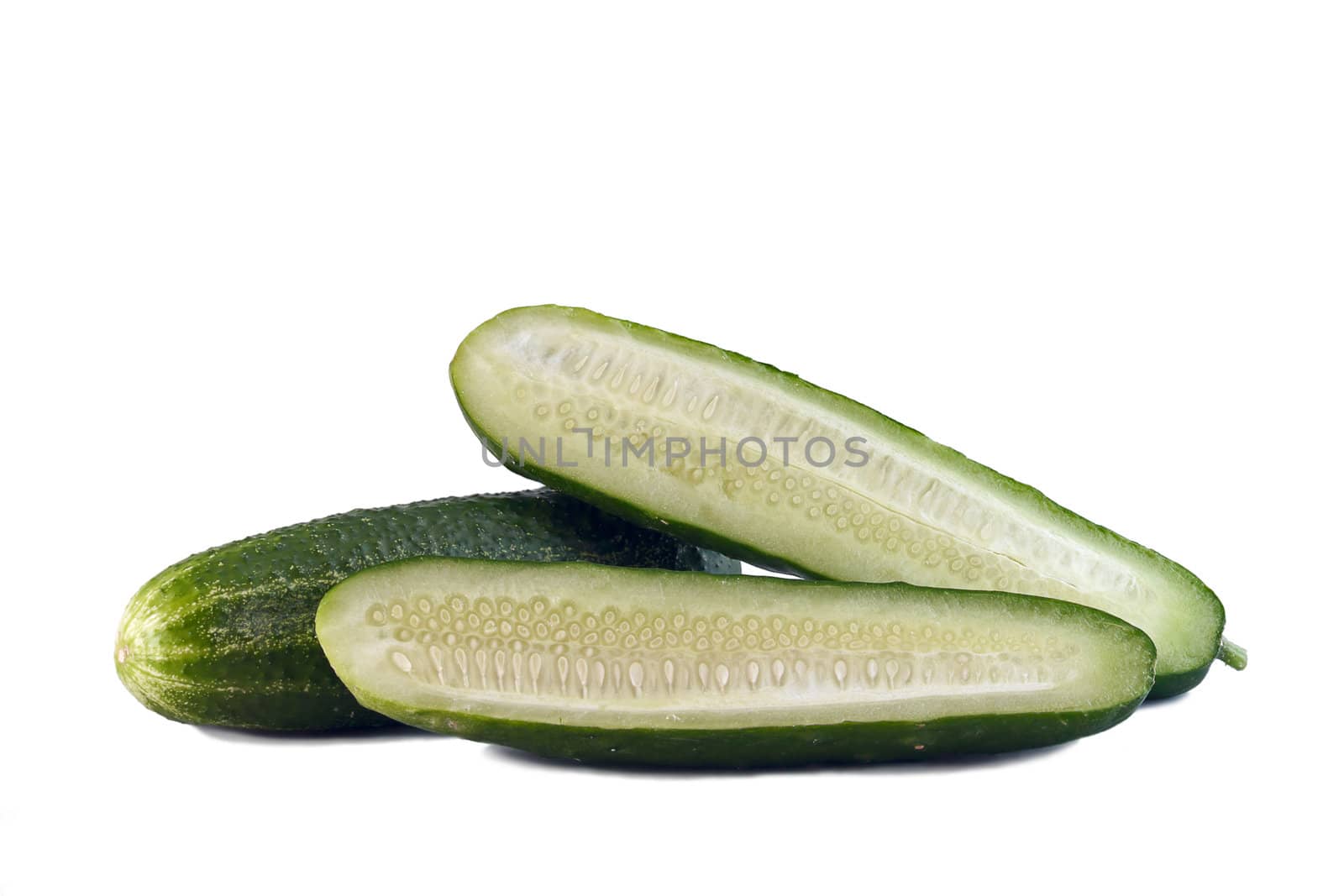 Green cucumbers close-up, isolated on white background.