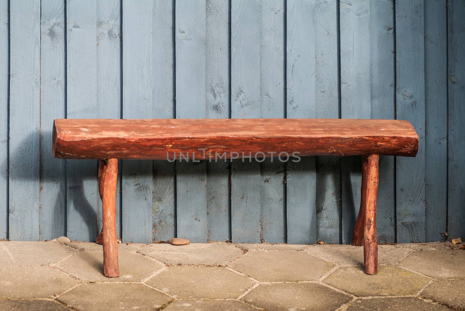 Wooden settee in front of a danish summer residence
