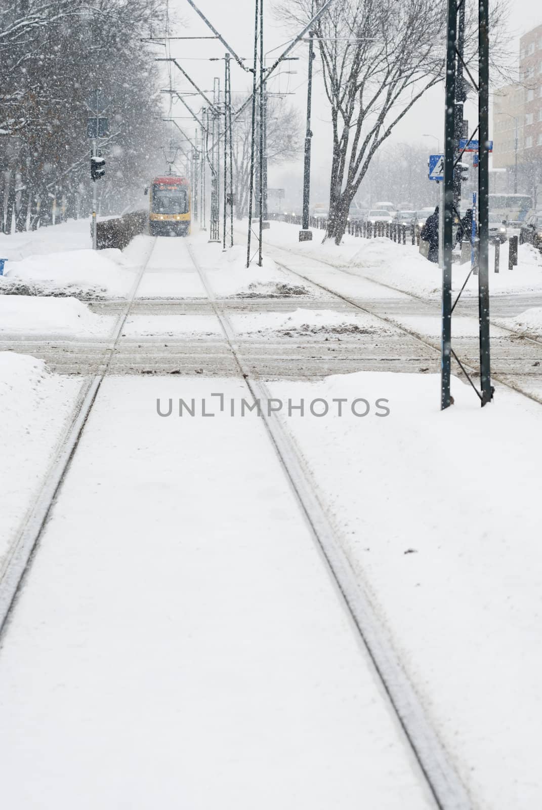 Approaching tram during heavy snow in Warsaw, Poland.