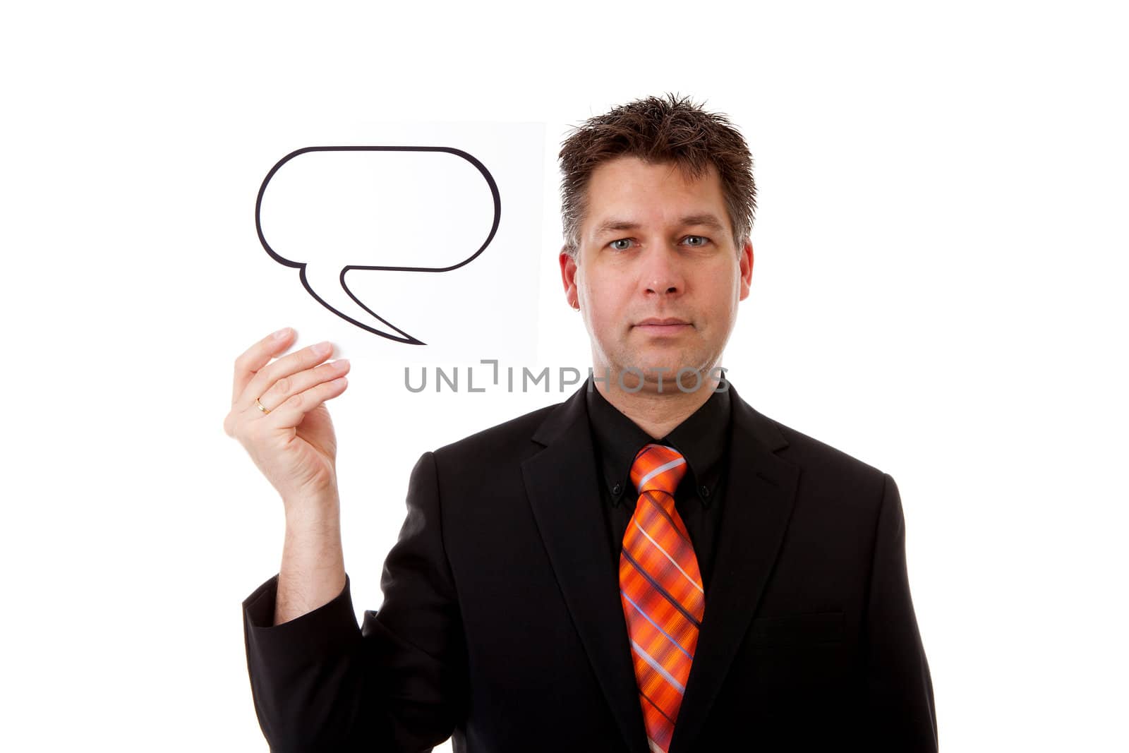 Businessman is holding a text balloon over white background