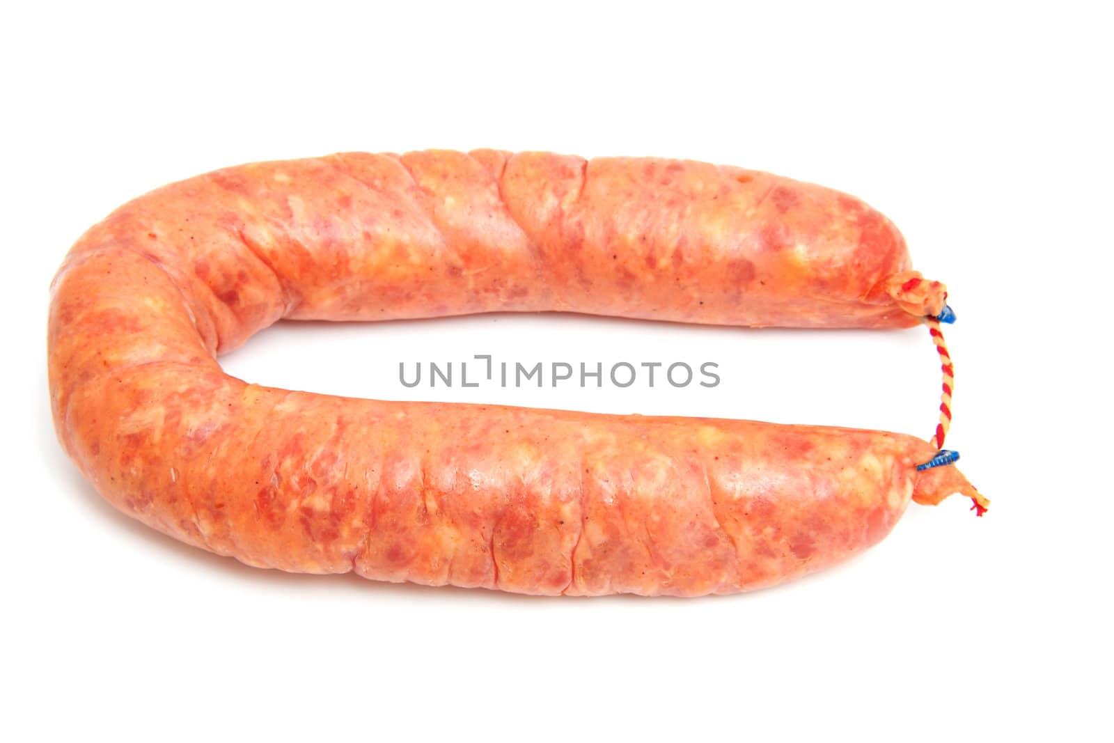 One raw fresh sausage over white background
