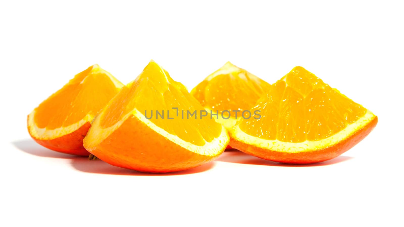 fresh slices of orange over white background