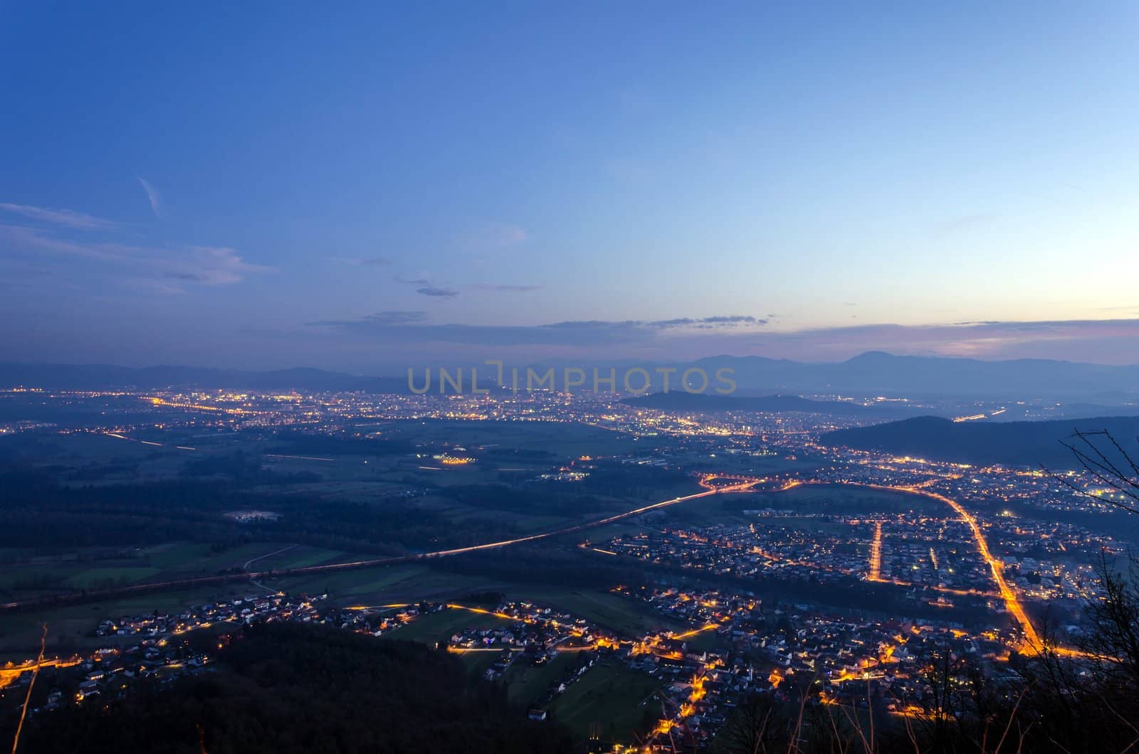 Panoramic night view on Ljubljana from top of Smarna mountain.