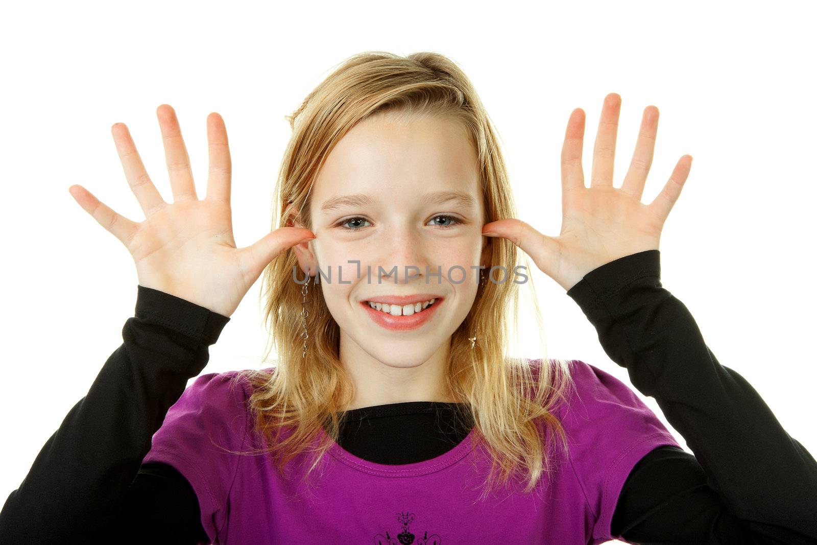 girl makes funny face over white background