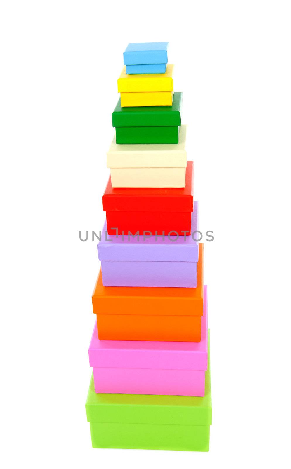 stacked colorful packaging boxes isolated on white background 
