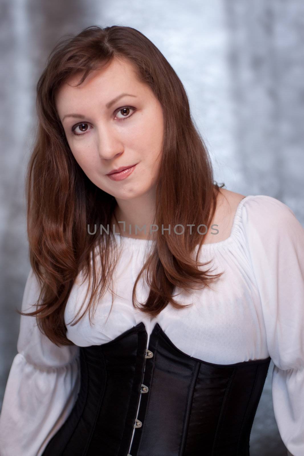 Portrait of a beautiful woman in medieval era dress