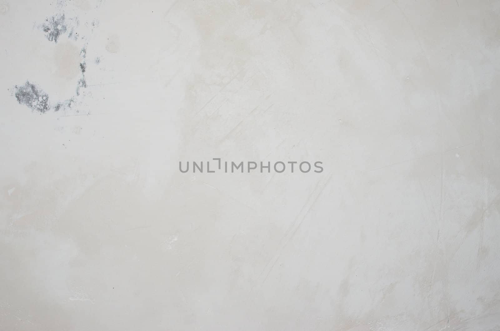 Concrete wall covered with putty as natural background