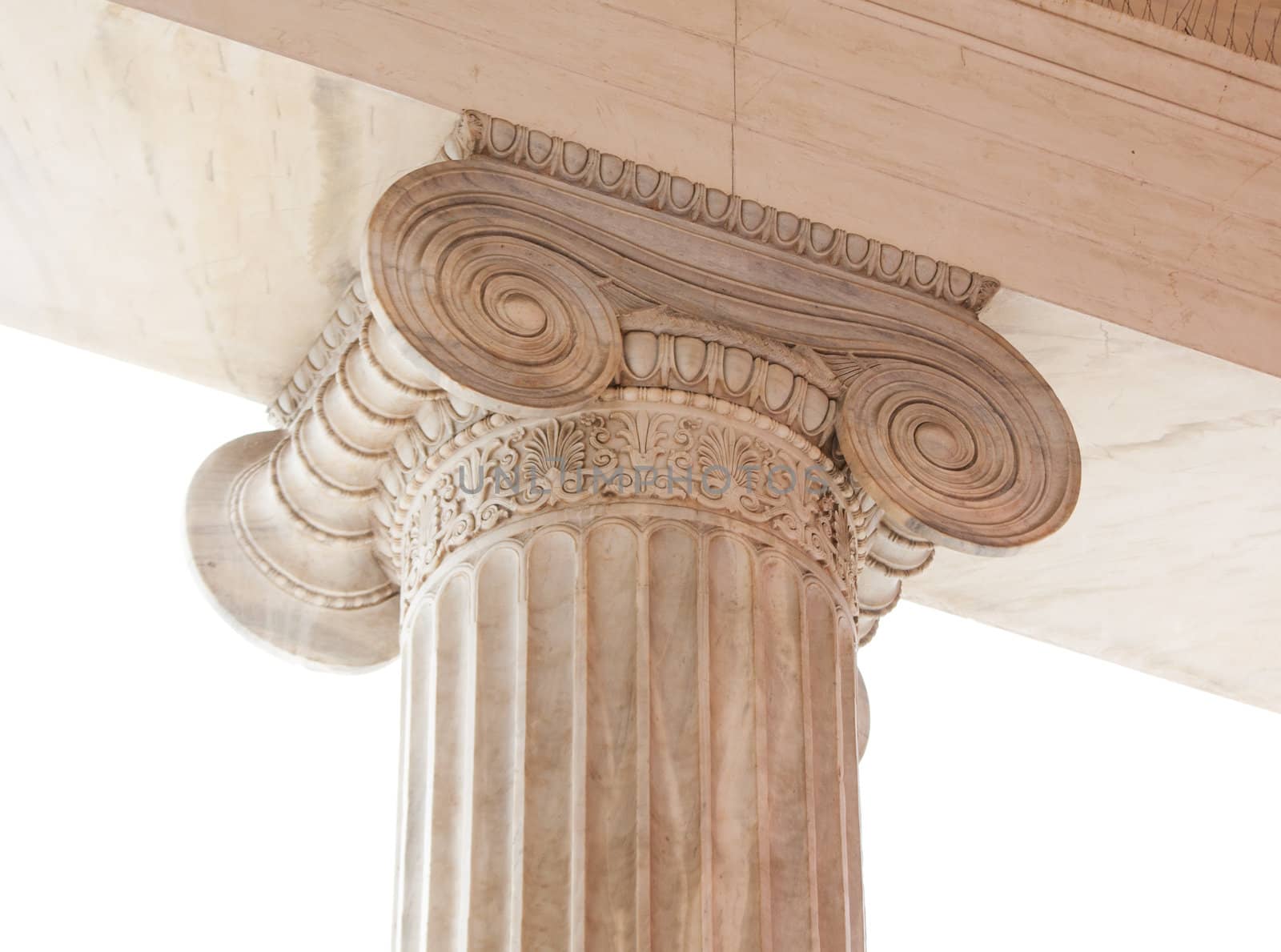 Closeup of capital (volute and abacus) of a nineteenth century neoclassical ionic column located in the porch of the Archaeological Museum of Athens, Greece.