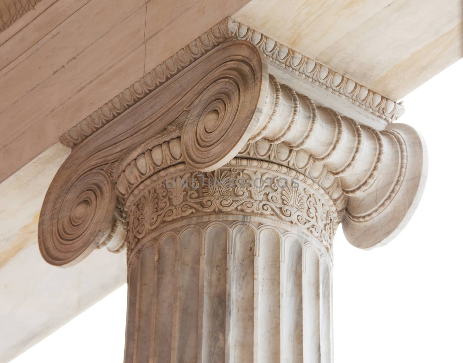 Closeup of capital (volute and abacus) of a nineteenth century neoclassical ionic column located in the porch of the Archaeological Museum of Athens, Greece.