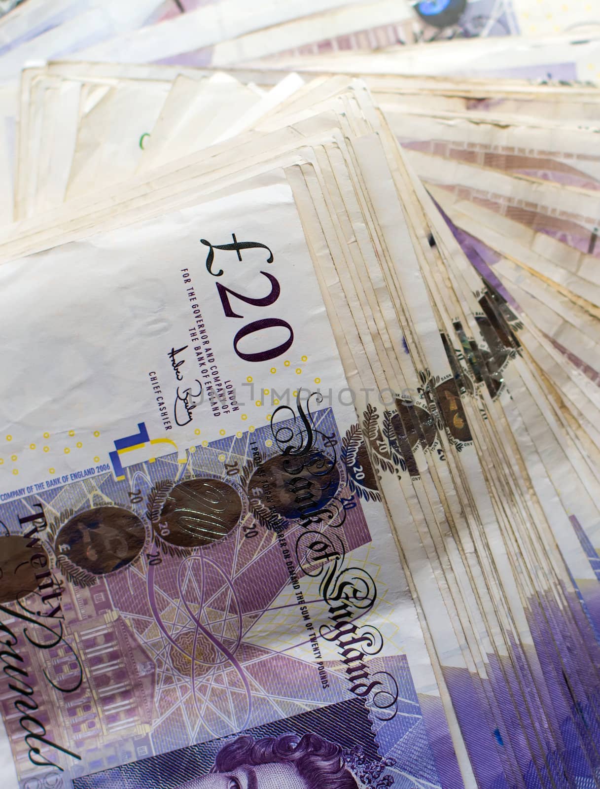 a large bundle of british twenty pound notes 