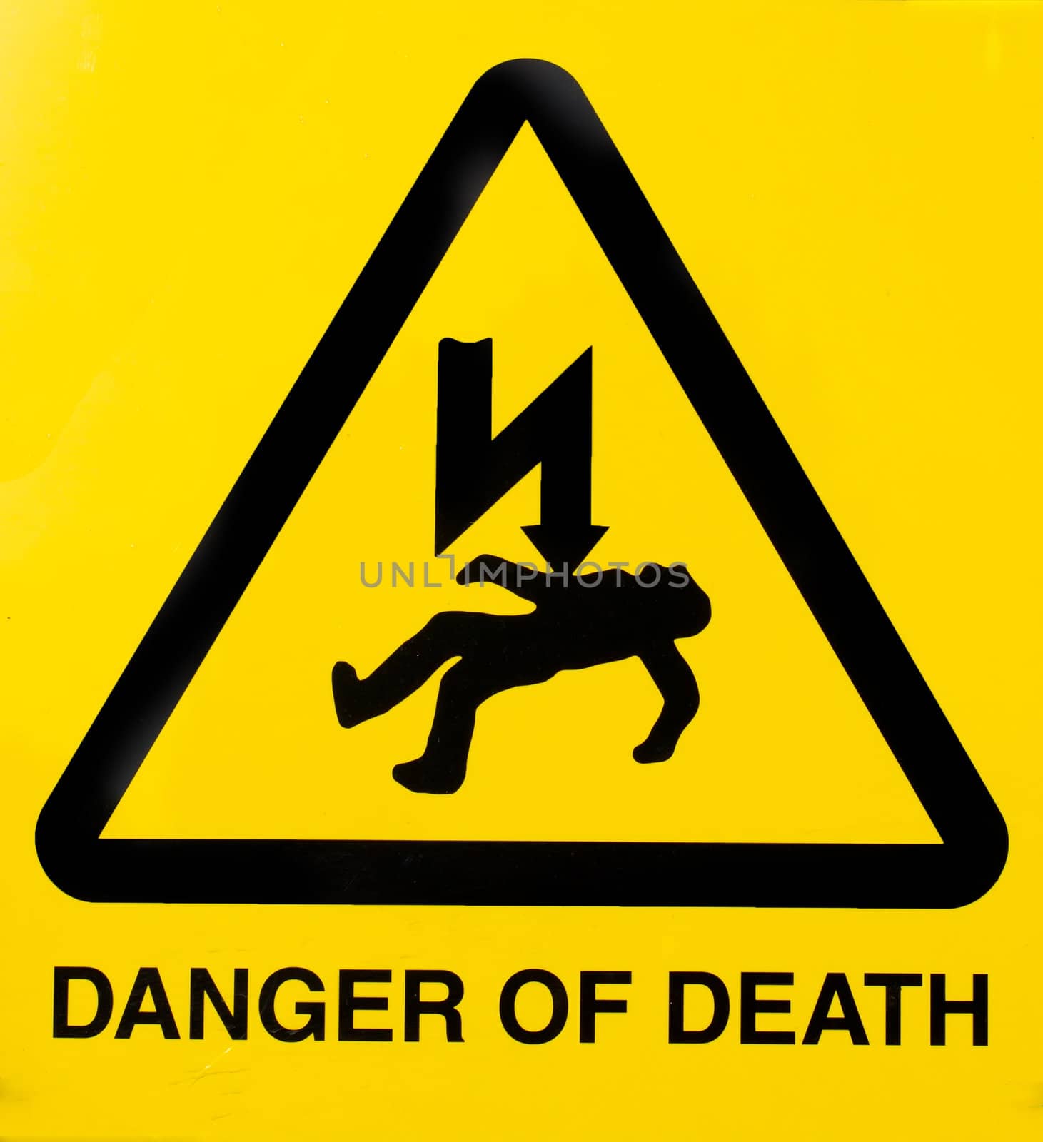 Danger of death sign on a barbed wire fence