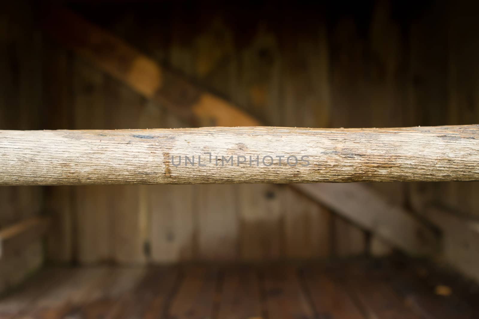 a length of wood inside a wooden structure