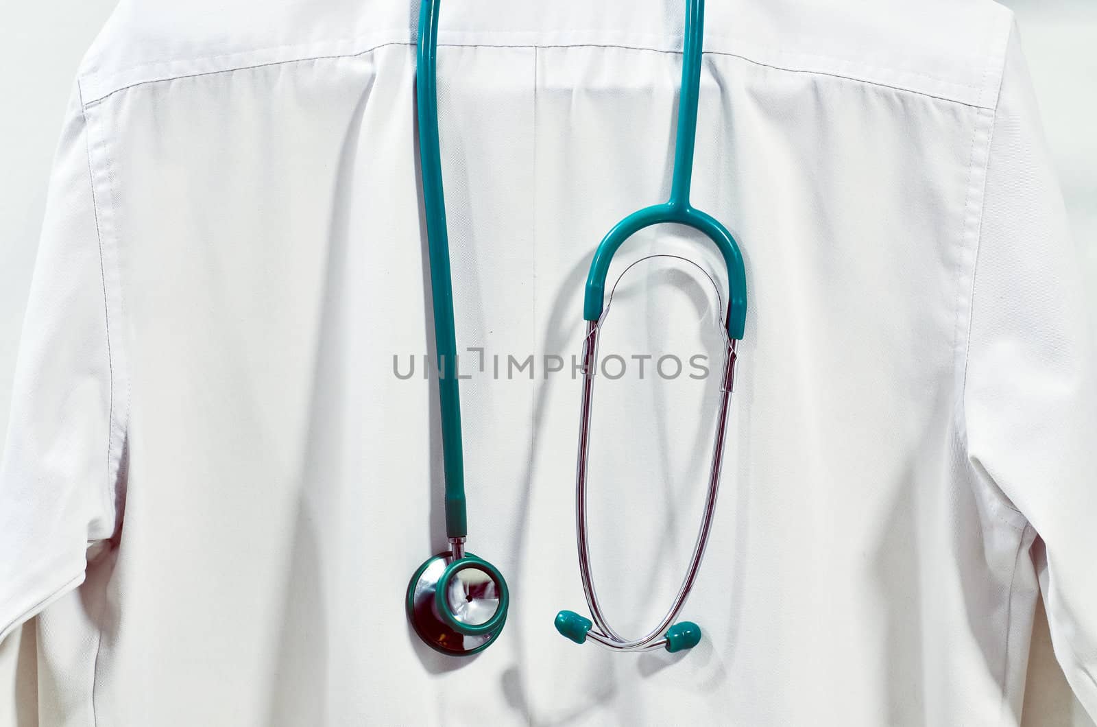 stethoscope on a doctor coat  by raweenuttapong