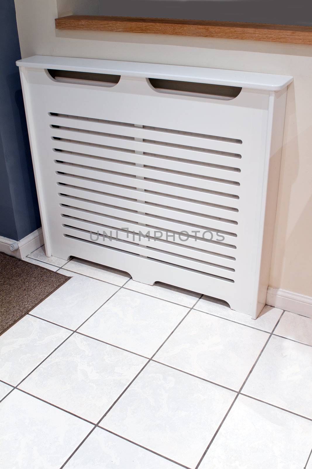 radiator cabinet cover in a modern kitchen