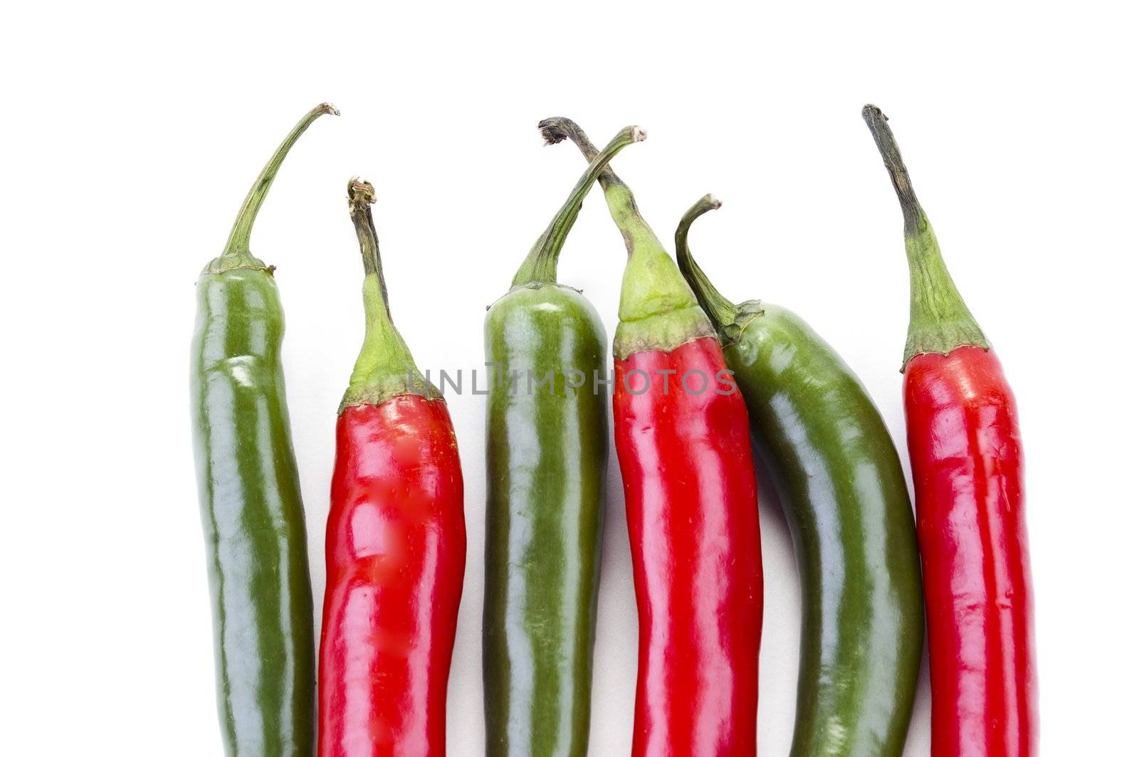 a series of green and red chili peppers
