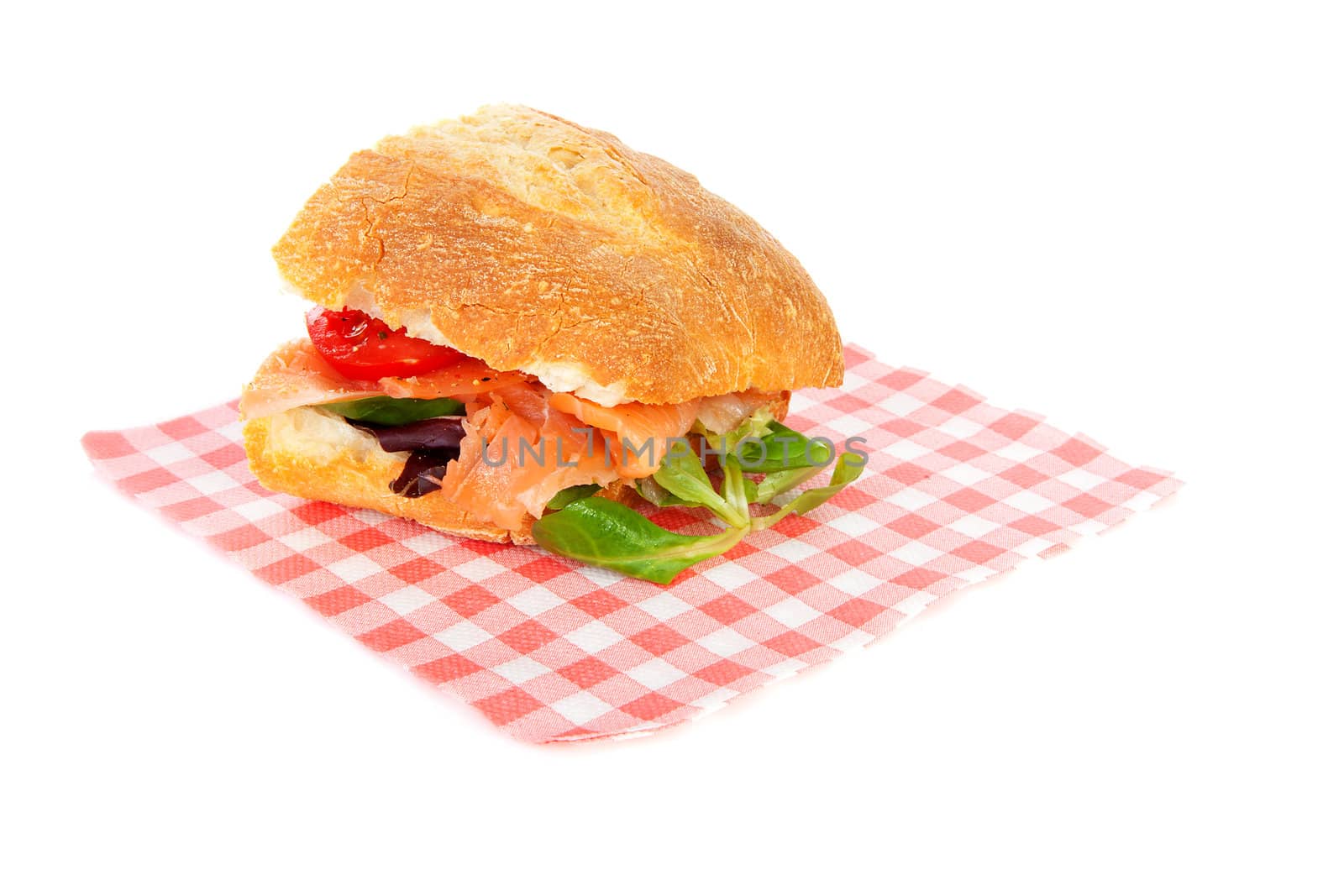 Healthy sandwich on napkin over white background