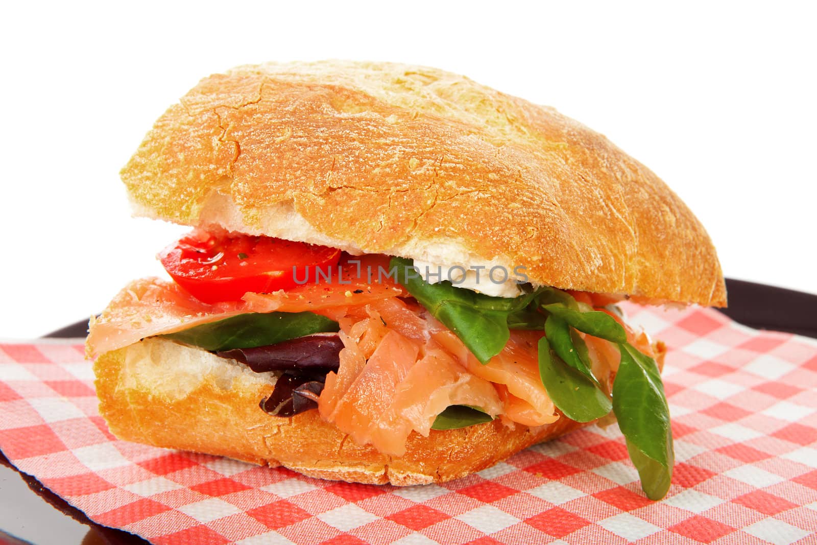 Healthy sandwich on napkin over white background