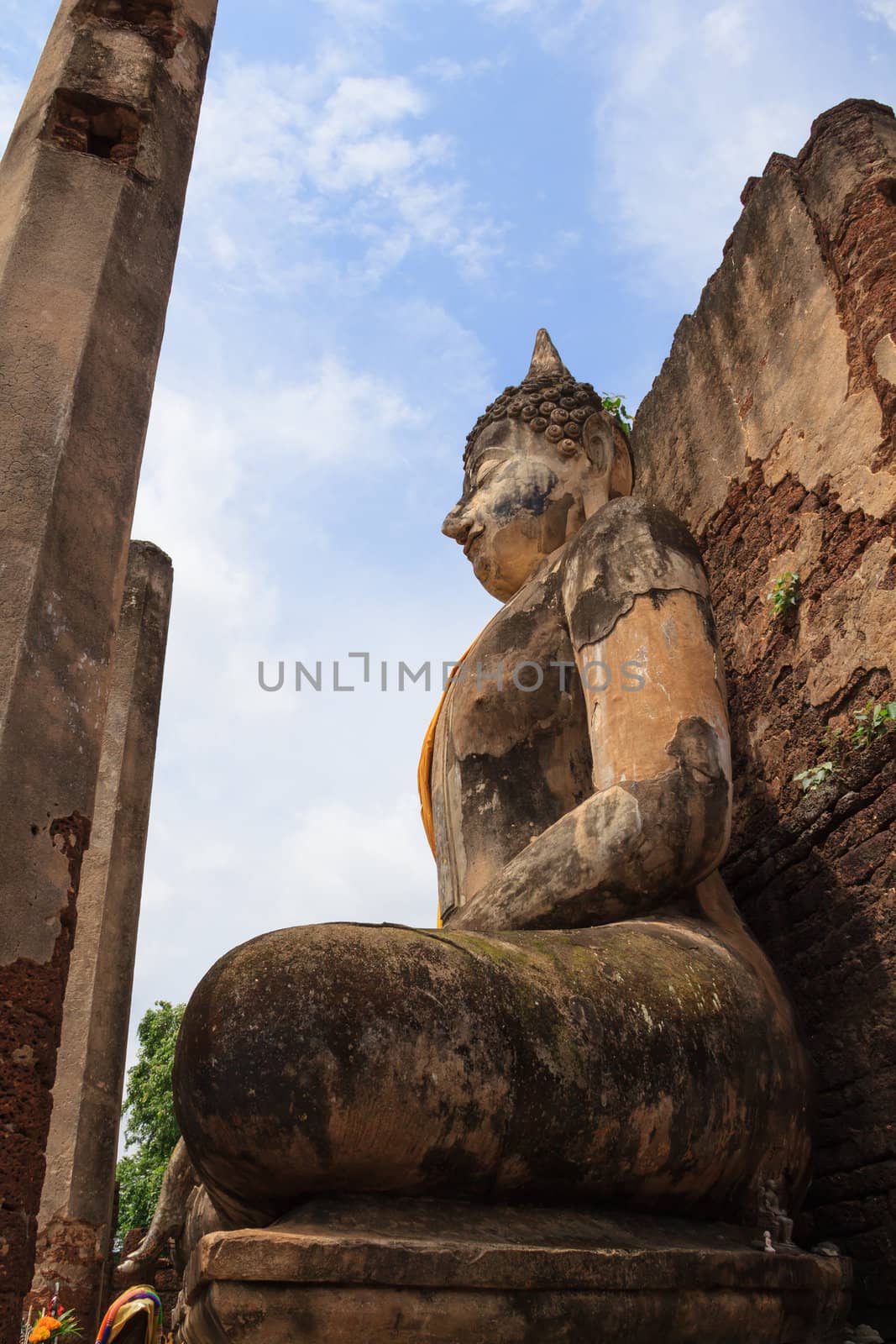 Buddha Statue at Temple in Sukhothai Historical park , Thailand