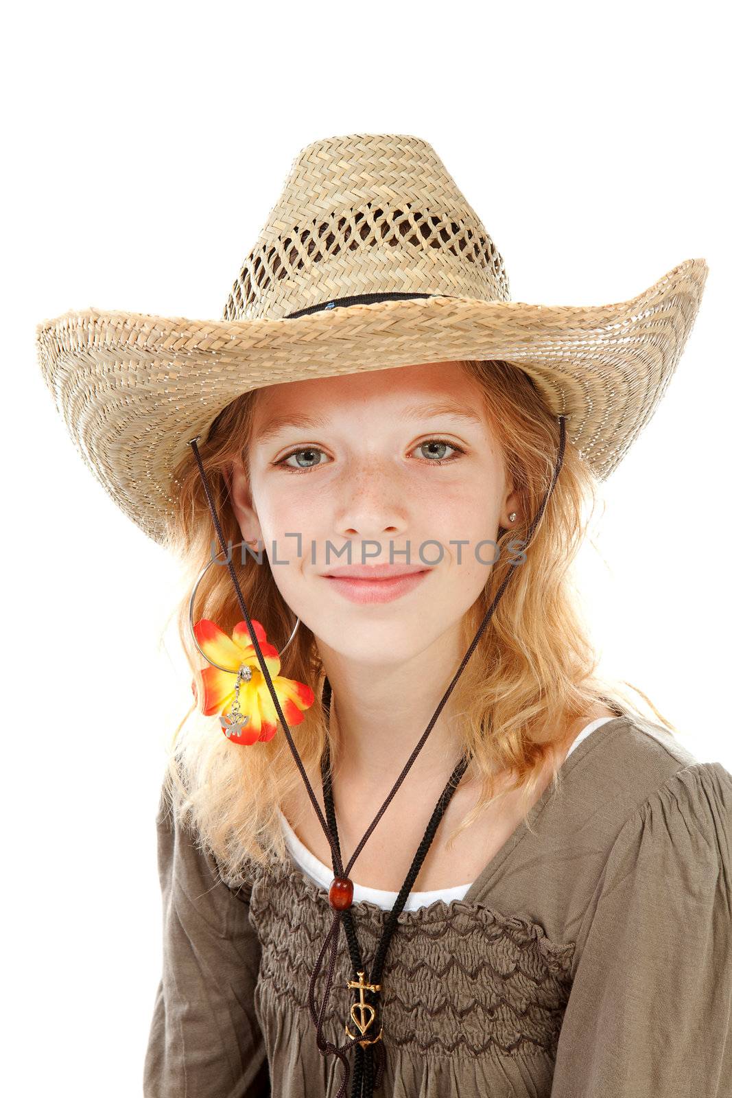 Young girl with western hat over white background