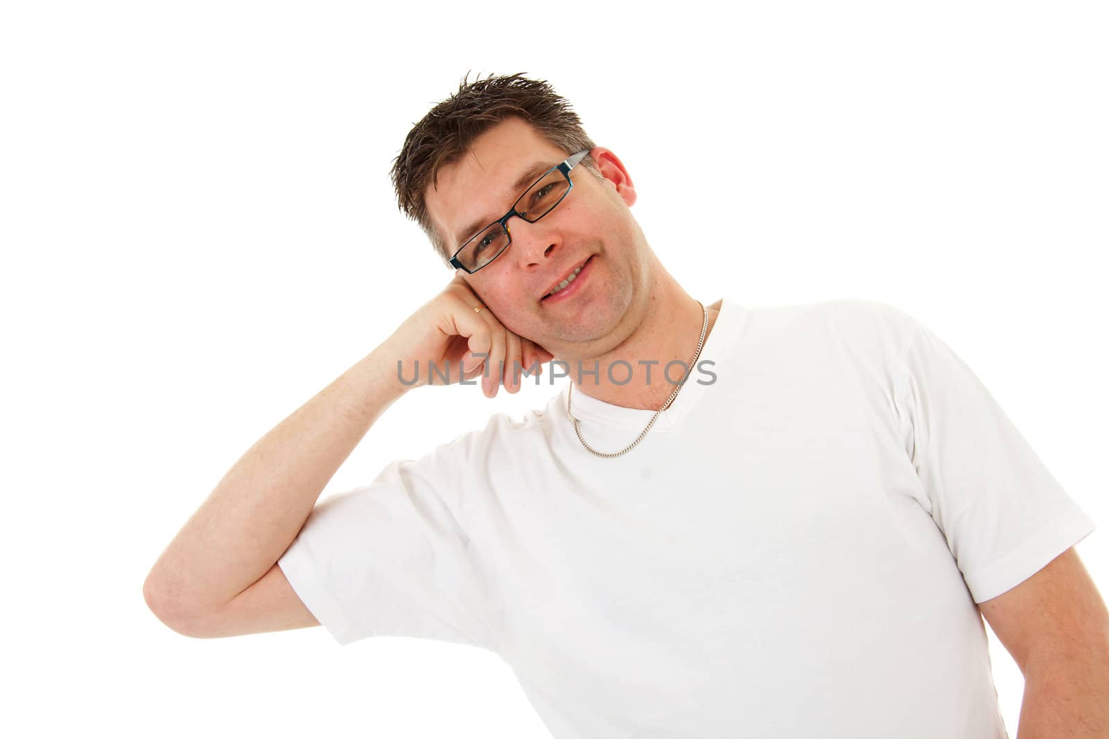 isolated man in white t-shirt is leaning and looking in camera