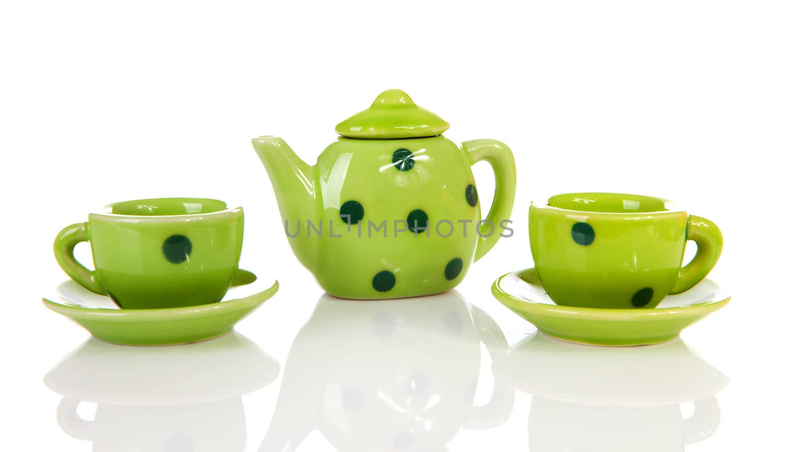 green dotted tablewear over white background