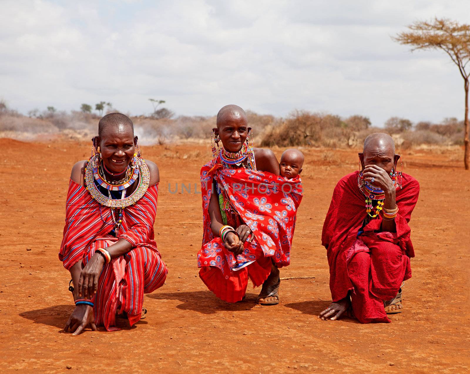 MASAI MARA, KENYA - JULY-2: unidentified African women from Masai tribe by traditional welcome dance on July 2, 2011 in a local village near Masai Mara National park, Kenya.