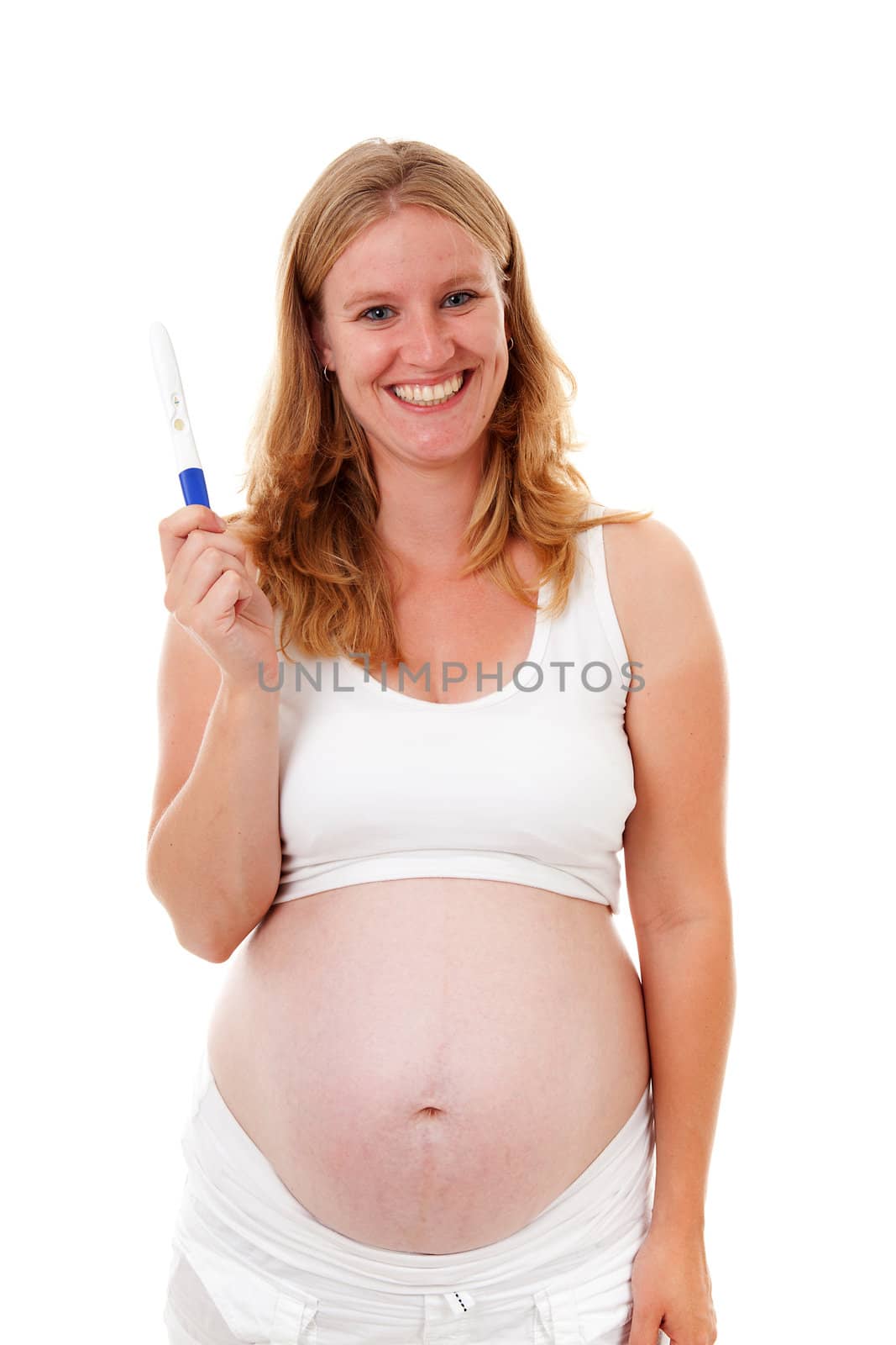 Woman is holding pregnancy test over white background
