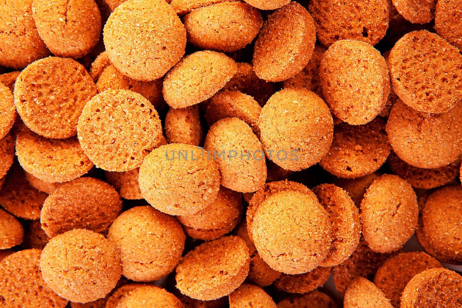 background of typical dutch sweets: pepernoten (ginger nuts) for a celebration at 5 december in the Netherlands 
