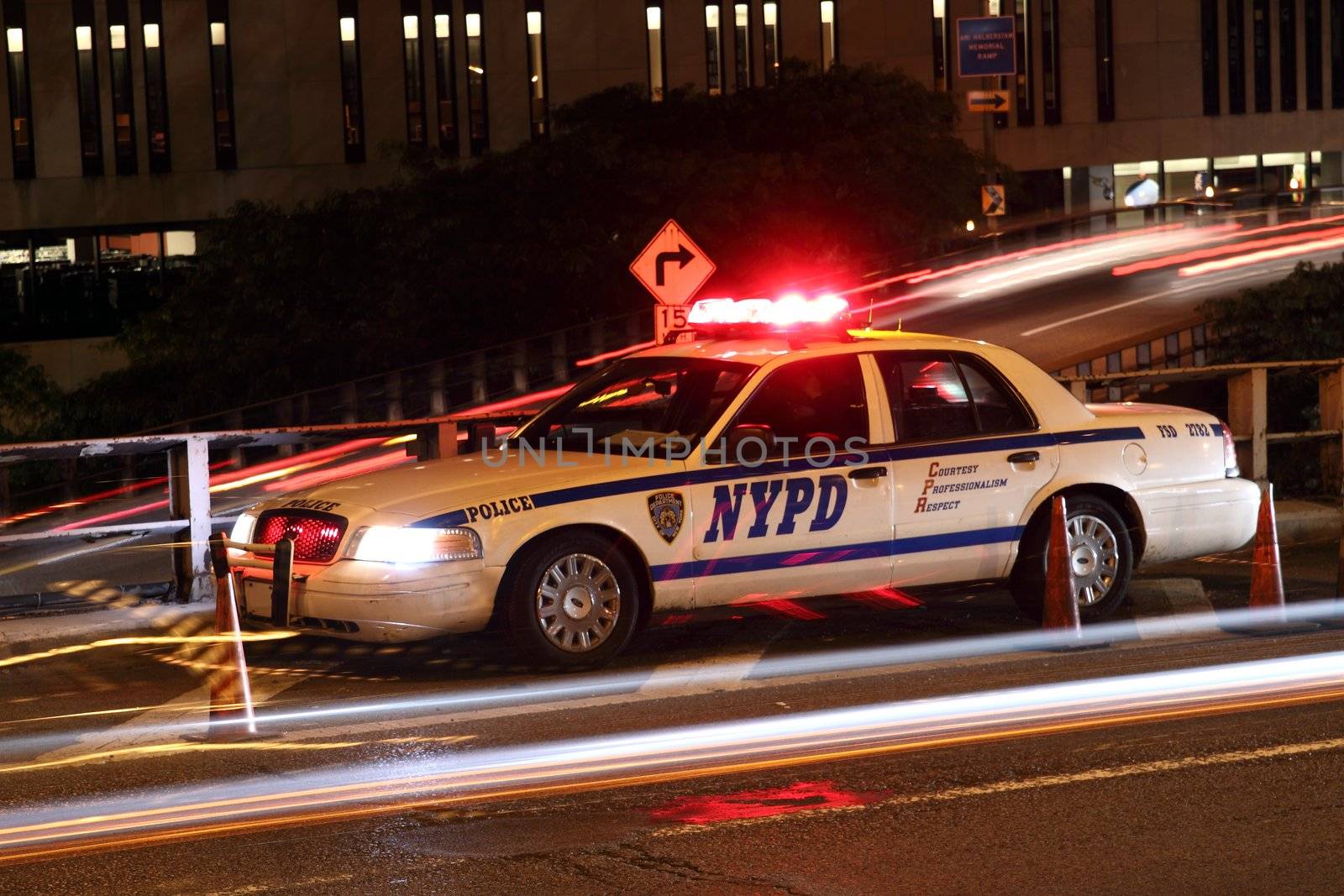 a police car in the night in New York City