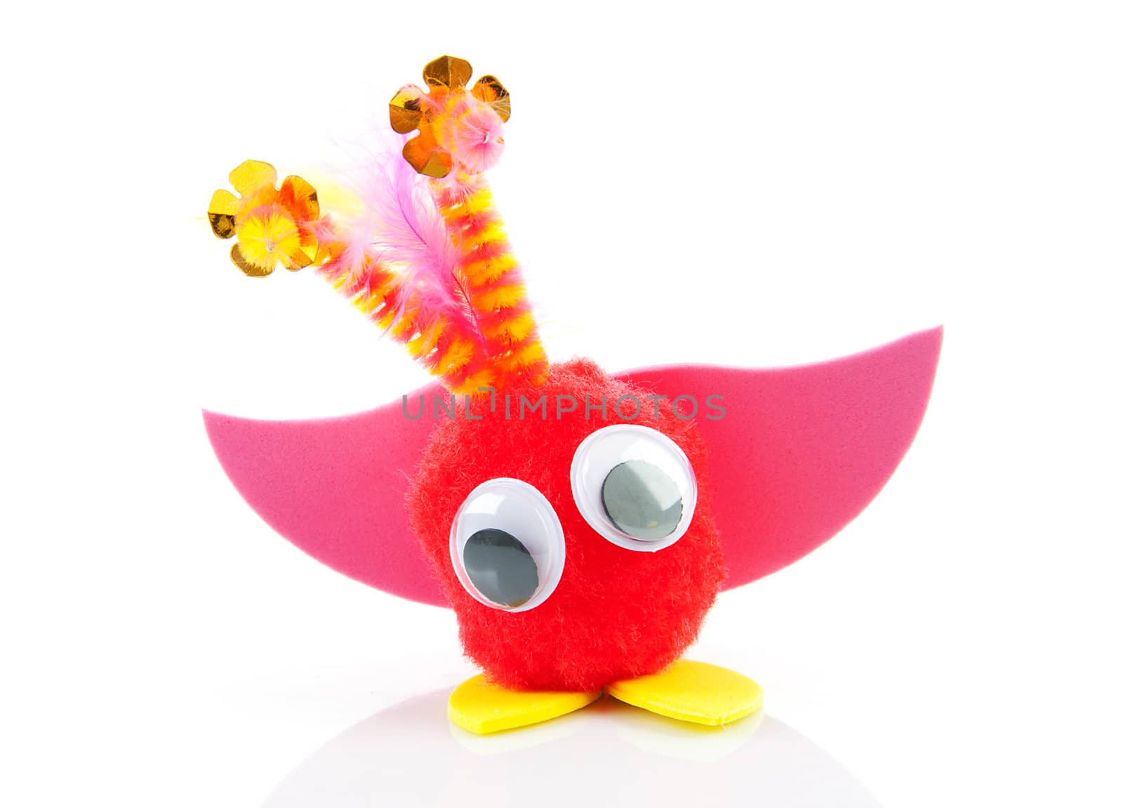 Colorful toy made by child over white background