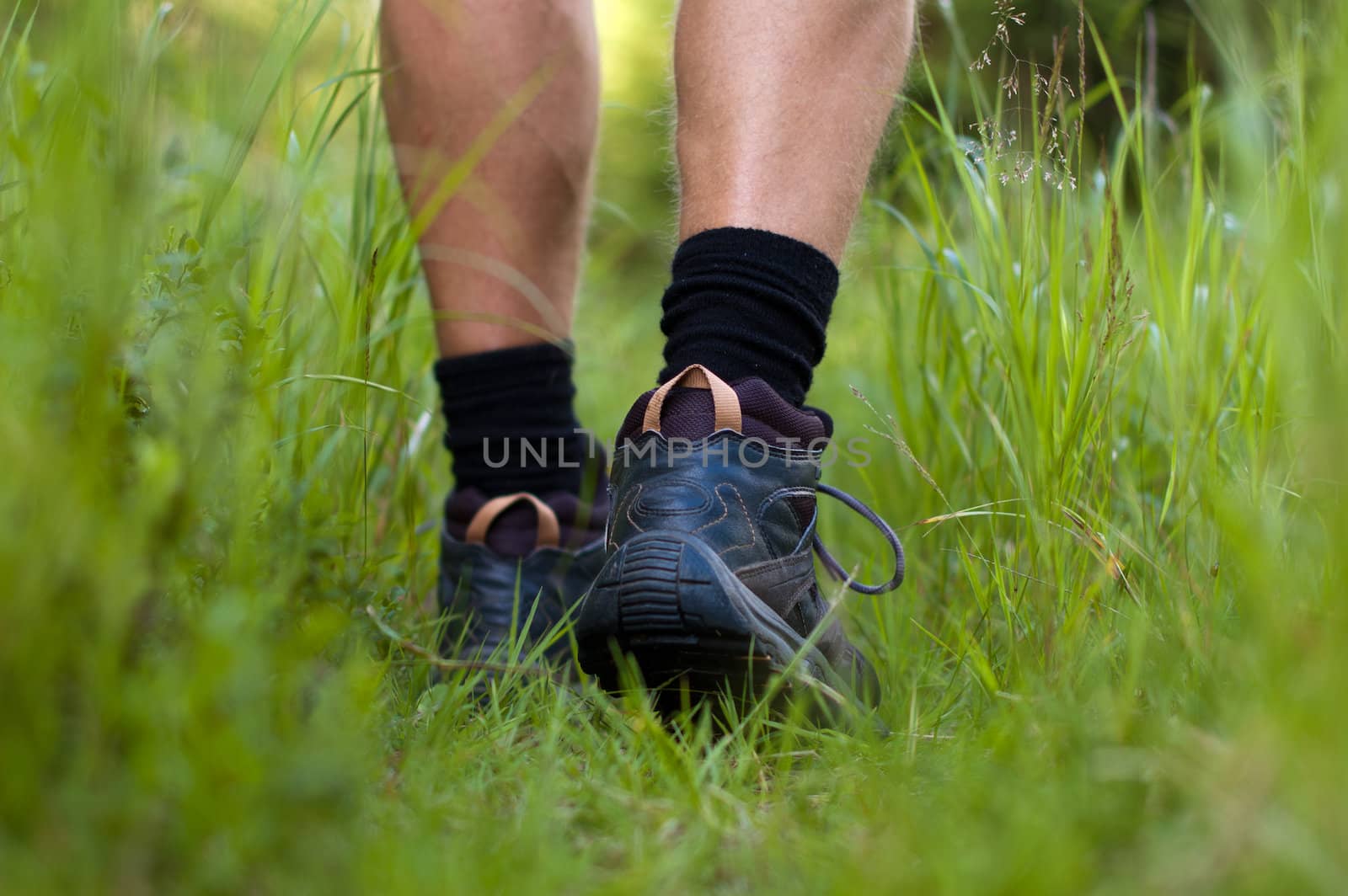 Hiking boots in a grass