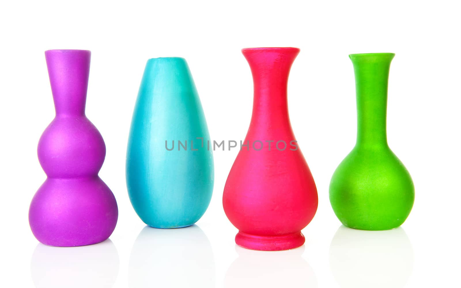 Four colorful empty vases over white background
