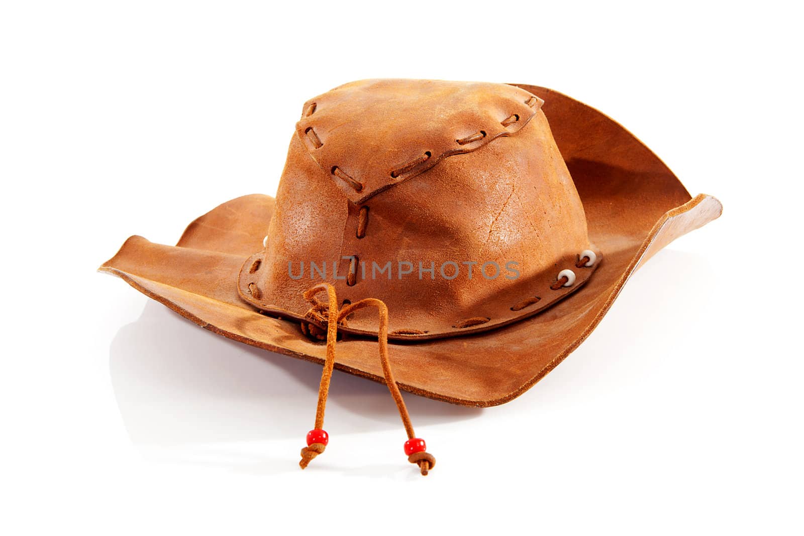 one brown western hat on white background 
