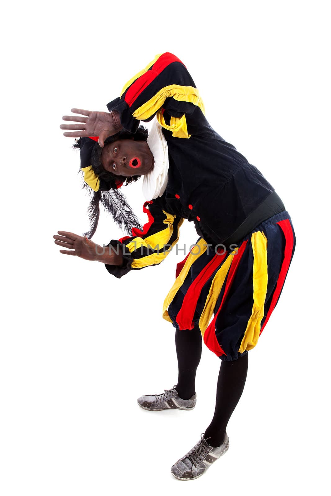 Zwarte piet ( black pete) typical Dutch character part of a traditional event celebrating the birthday of Sinterklaas in december over white background