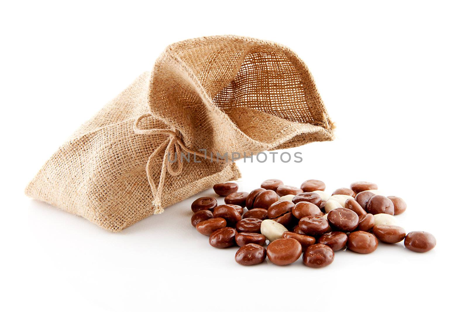 Typical Dutch celebration: Sinterklaas with bag and chocolate ginger nuts, ready for the kids in december. Isolated on white background