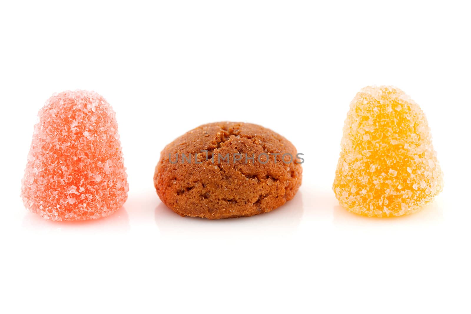 Couple of pepernoten (ginger nuts) and tumtum sweets for typical Dutch festivity at 5 december over white background