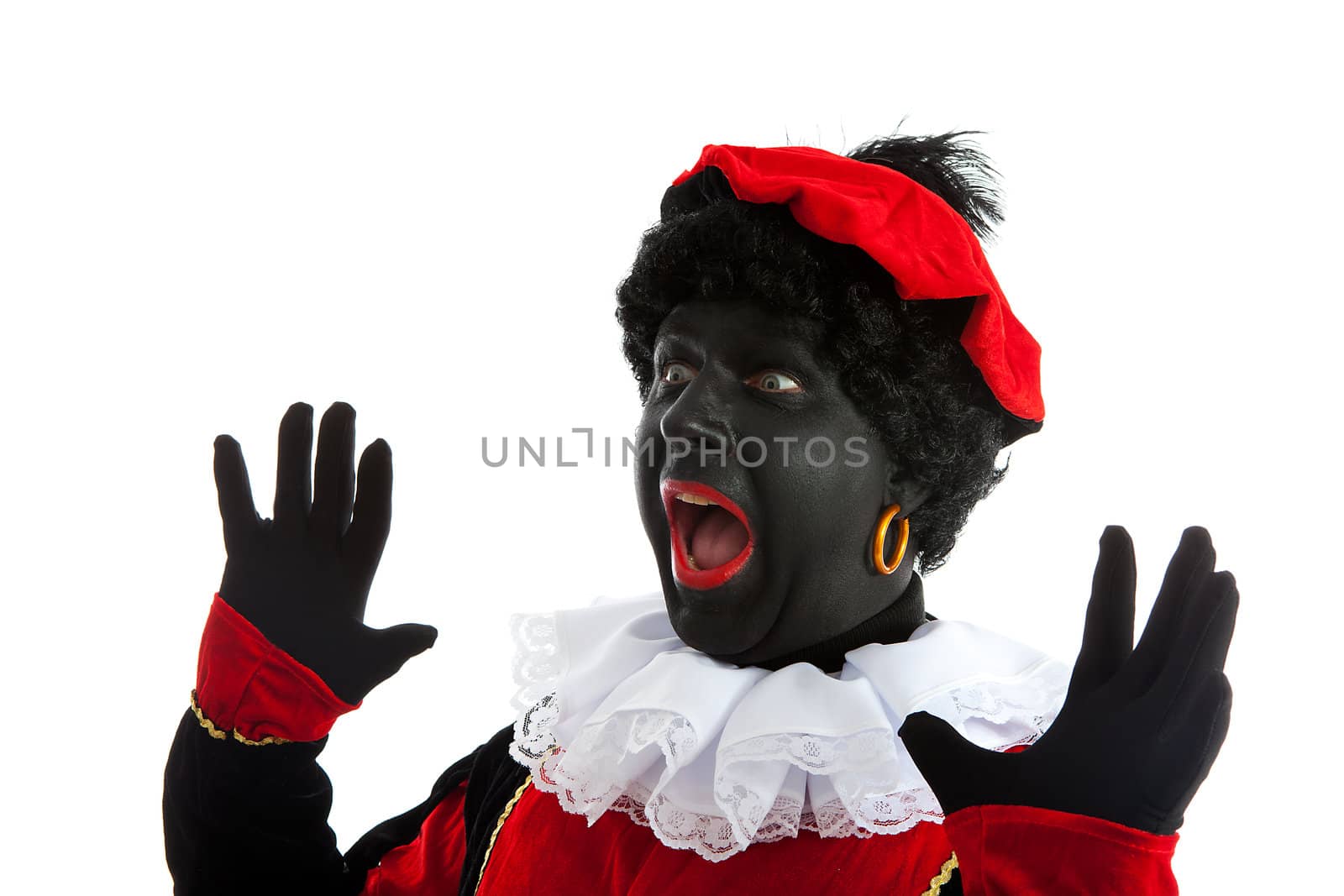 Zwarte piet ( black pete) typical Dutch character part of a traditional event celebrating the birthday of Sinterklaas in december over white background is looking surprised