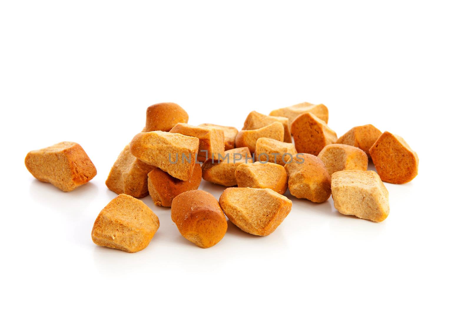 Old fashioned chuncks pepernoten ( ginger nuts) over white background