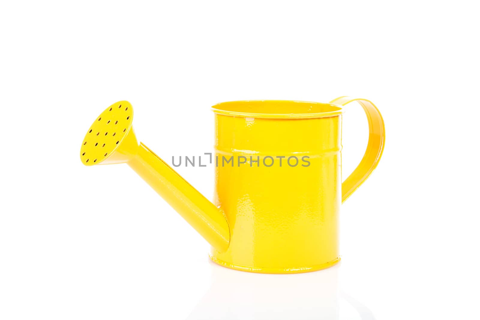 One yellow watering can over white background