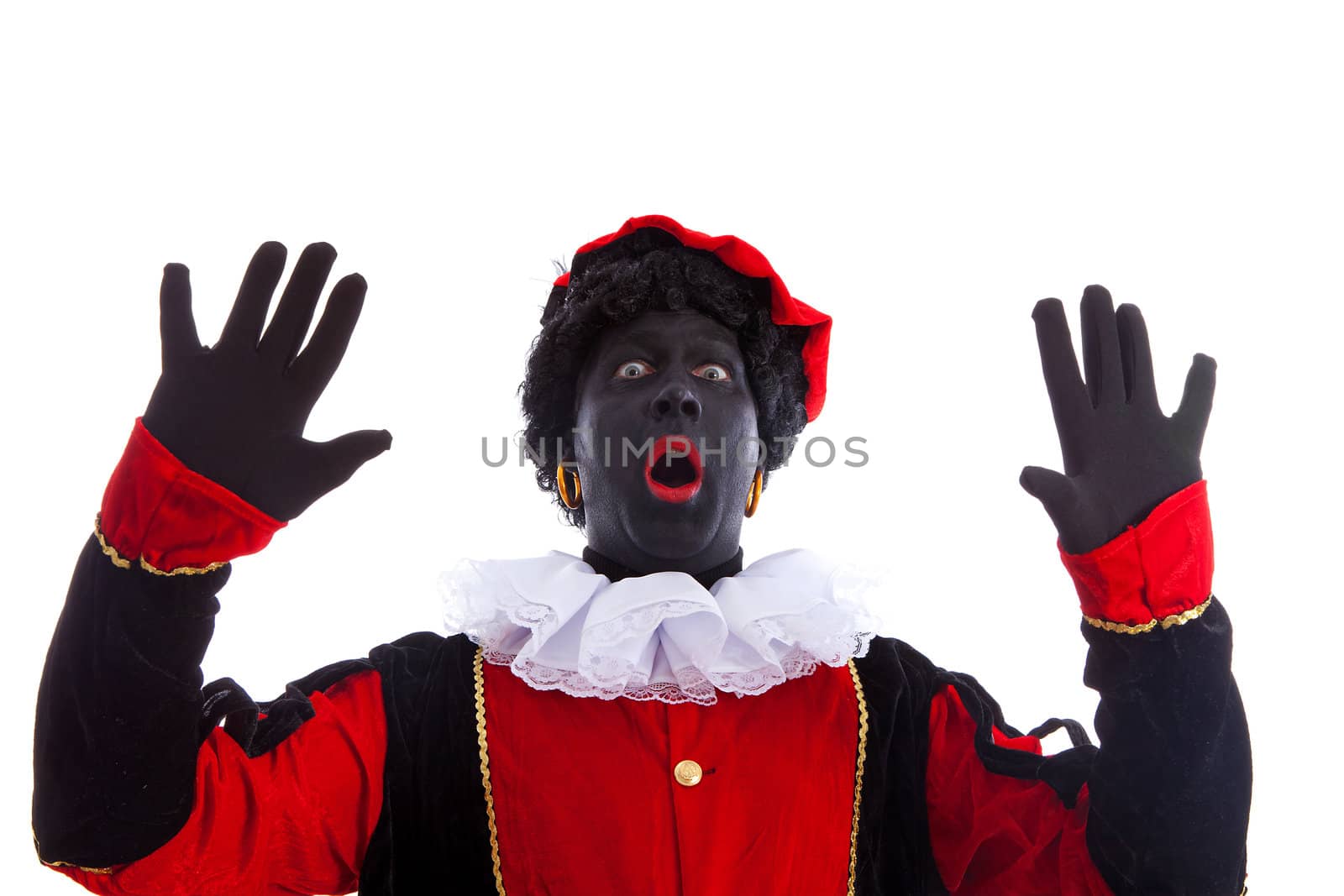 Zwarte piet ( black pete) typical Dutch character part of a traditional event celebrating the birthday of Sinterklaas in december over white background is looking surprised