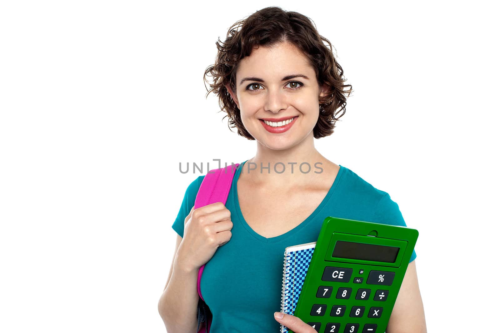Female student holding education accessories by stockyimages