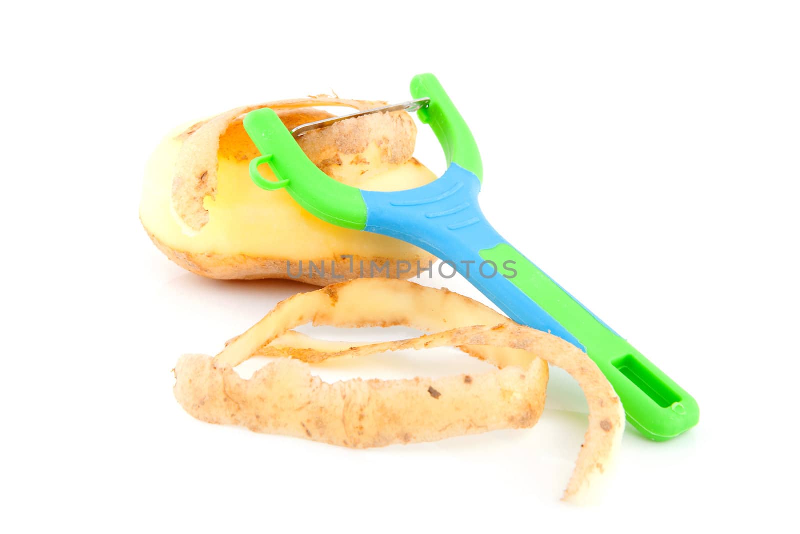 One potato with colorful peeling knife over white background