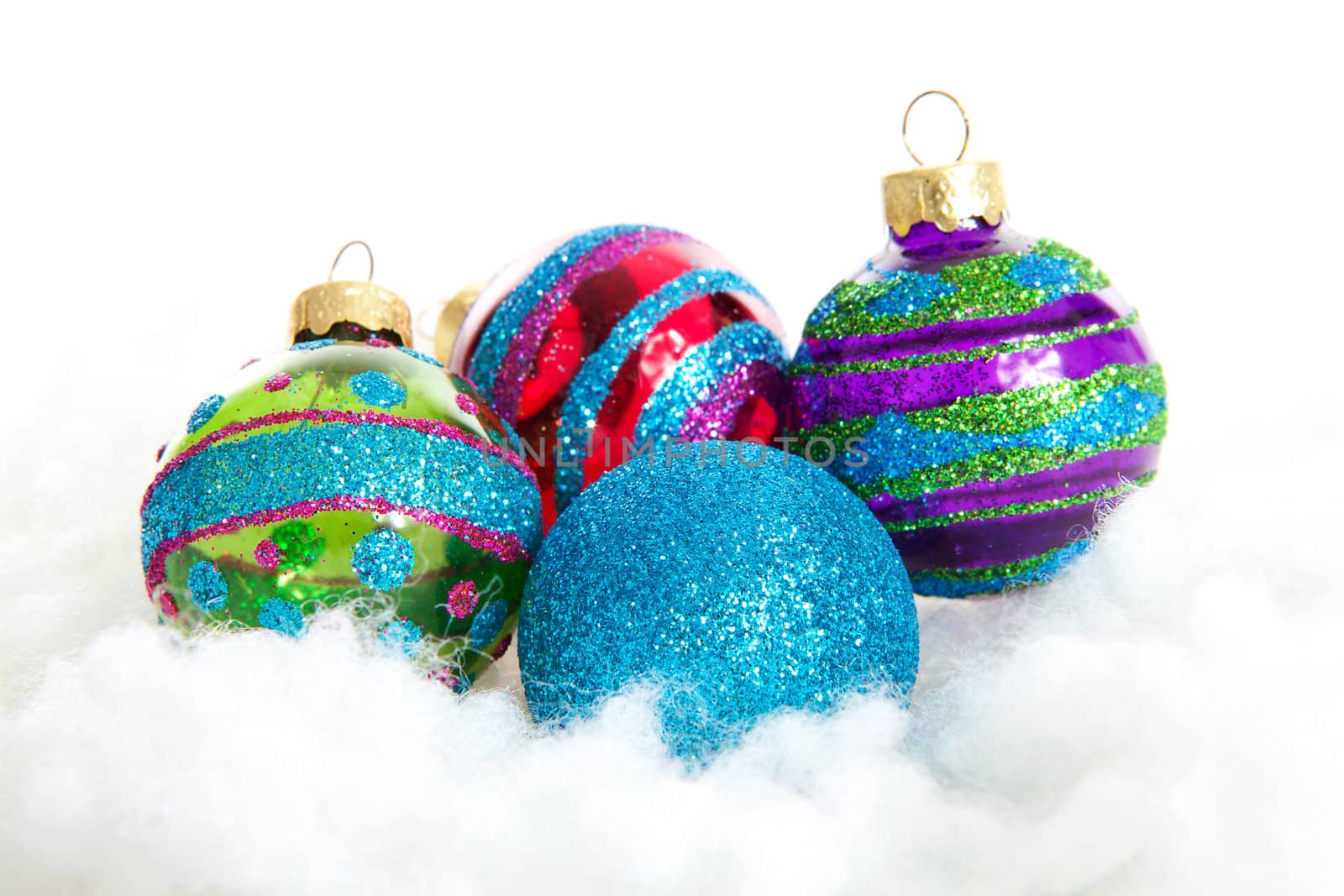 Colorful glitter Christmas balls over white background