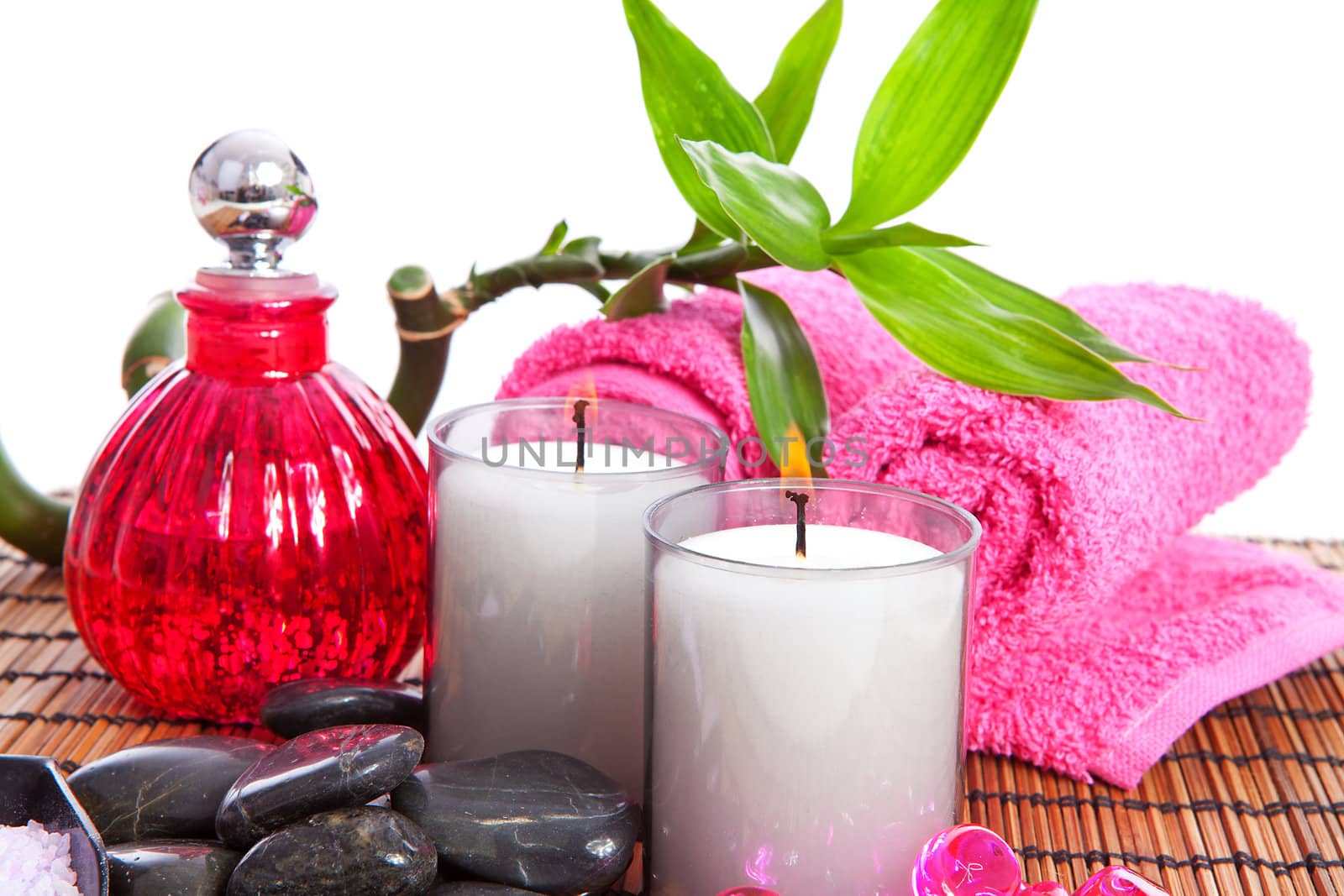 pink spa zen accessories and bamboo on cane mat