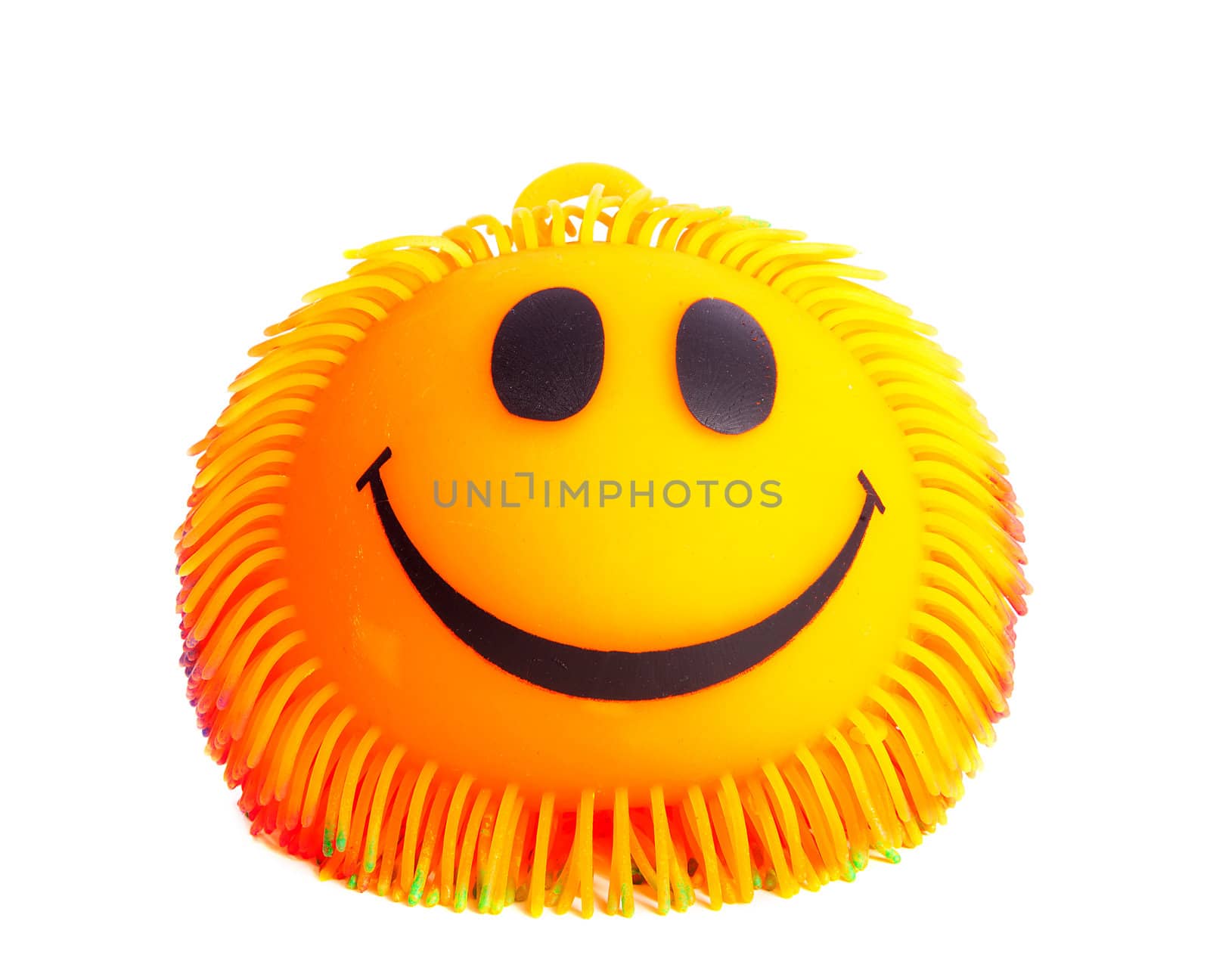 Funny orange face with big eyes in closeup over white background 
