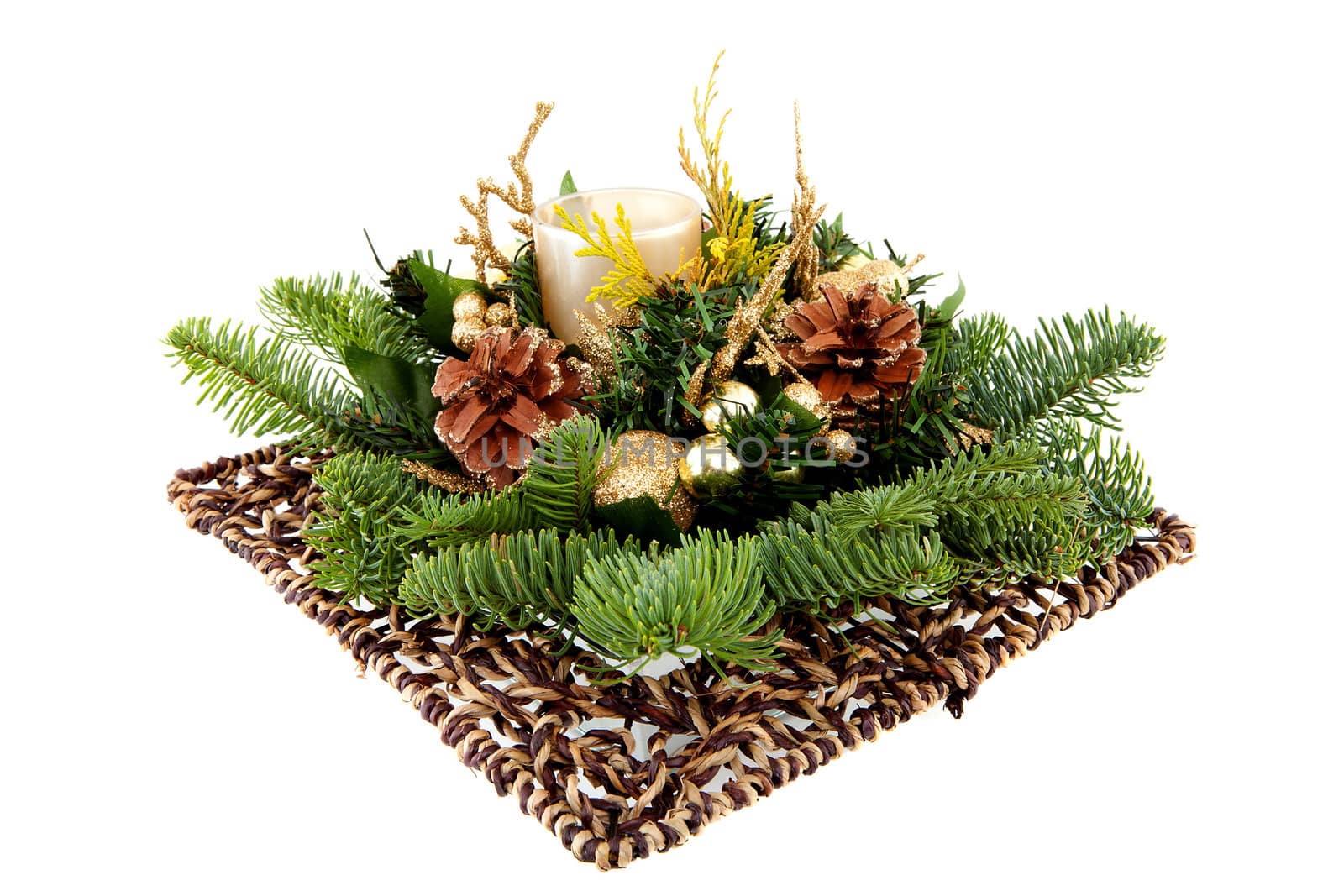 Christmas arrangement in closeup over white background